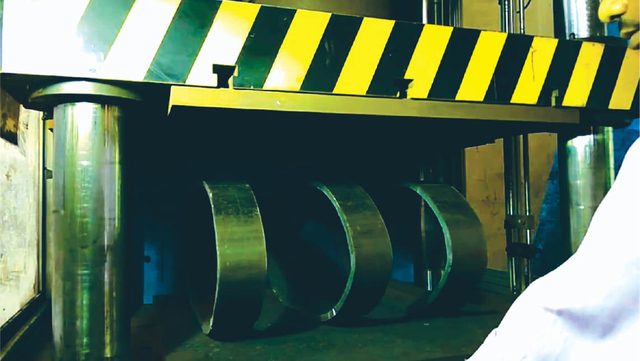 Pipe samples after flattening test in the press